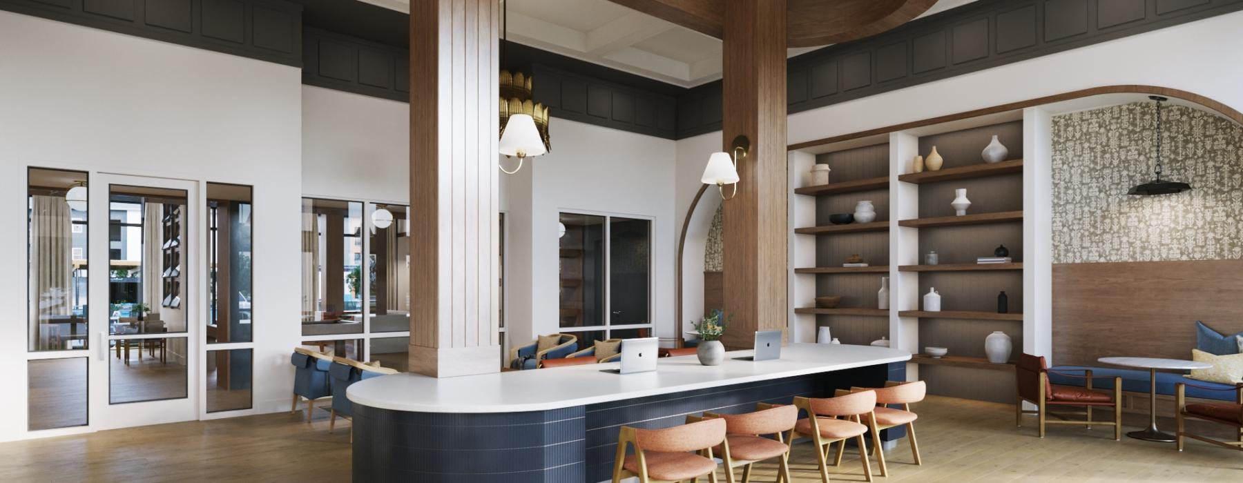 a well-lit room with a bar and chairs